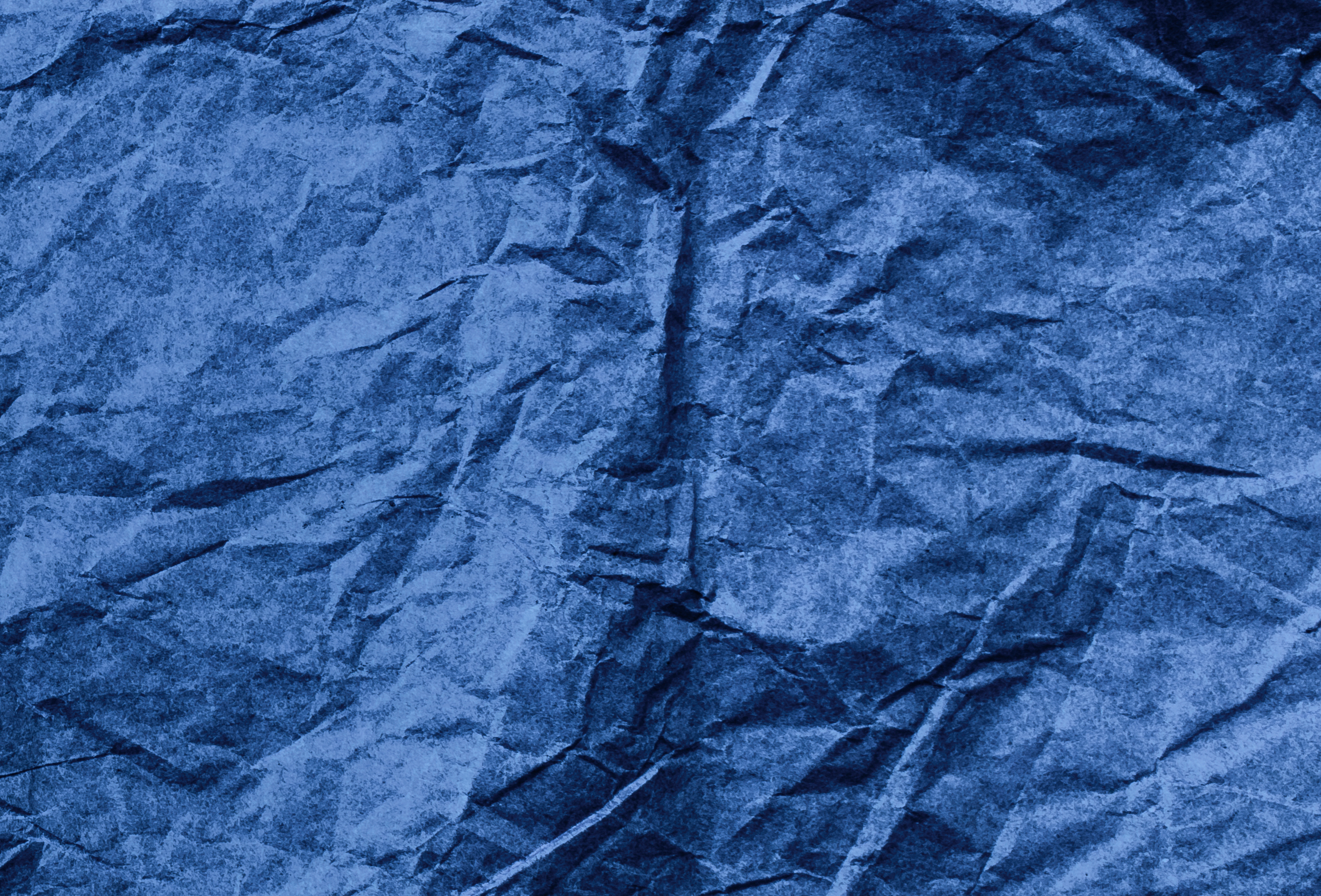 Wrinkled tissue paper in violet color at the angle